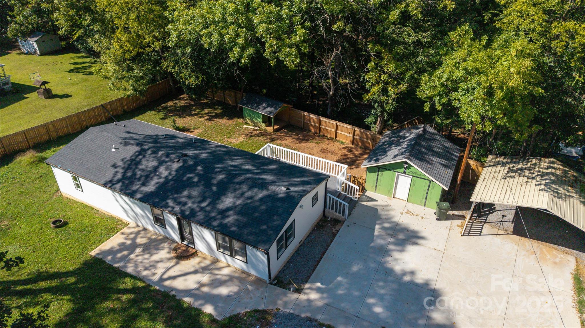 4946 Grand Canyon Road Northwest Concord, NC 28027 - Photo 17 of 40 a view of a yard with chairs