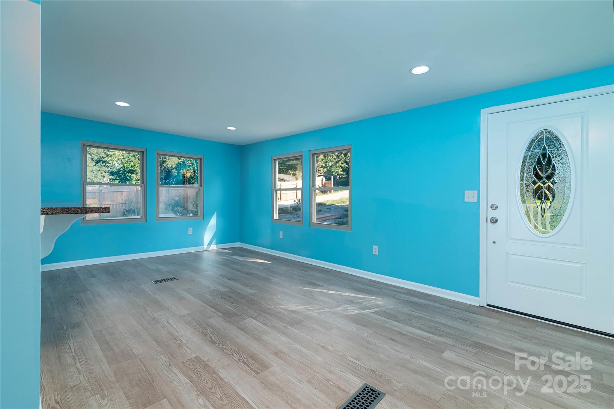 4946 Grand Canyon Road Northwest Concord, NC 28027 - Photo 22 of 40 an empty room with window and mirror fan