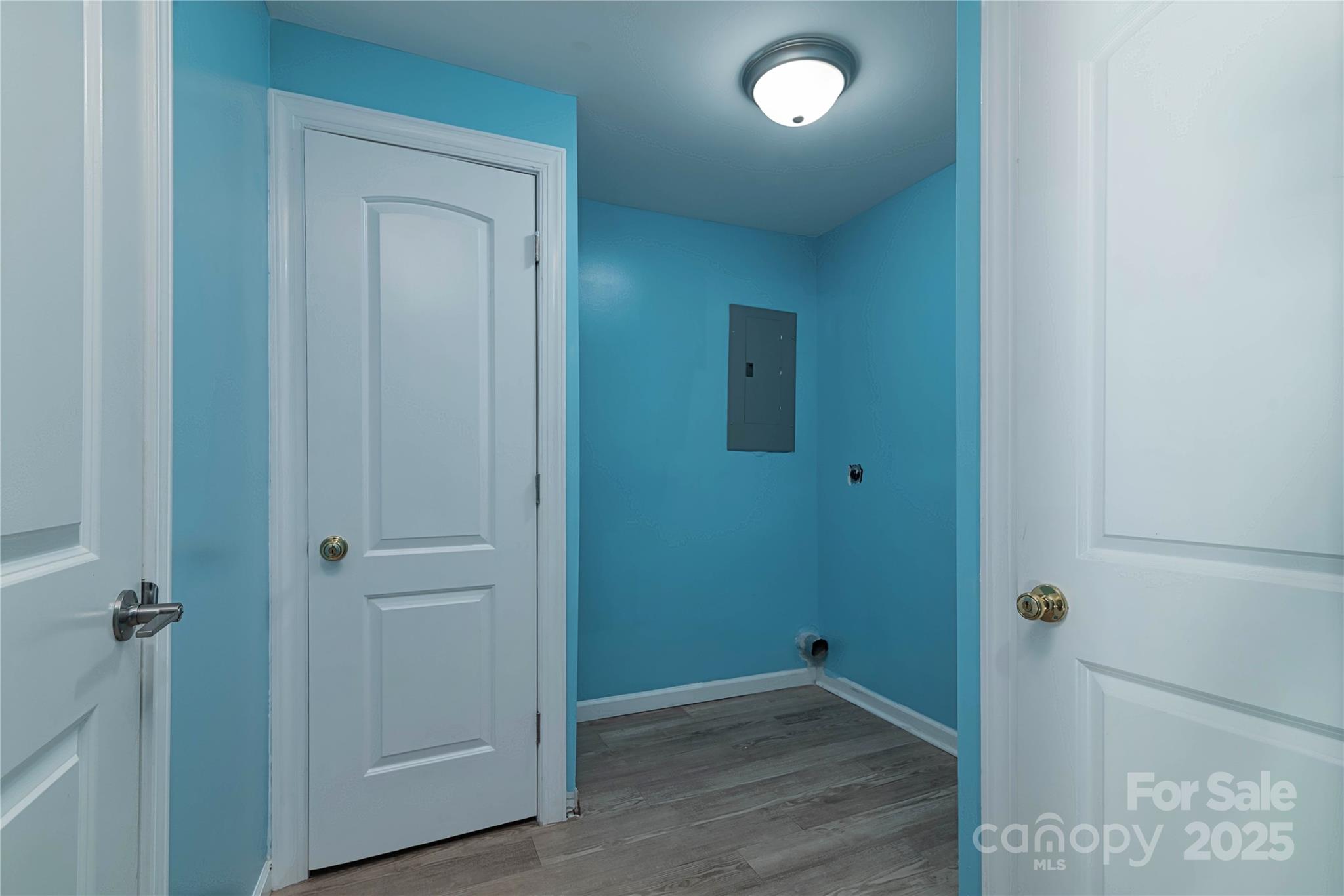 4946 Grand Canyon Road Northwest Concord, NC 28027 - Photo 33 of 40 an empty room with wooden floor and closet