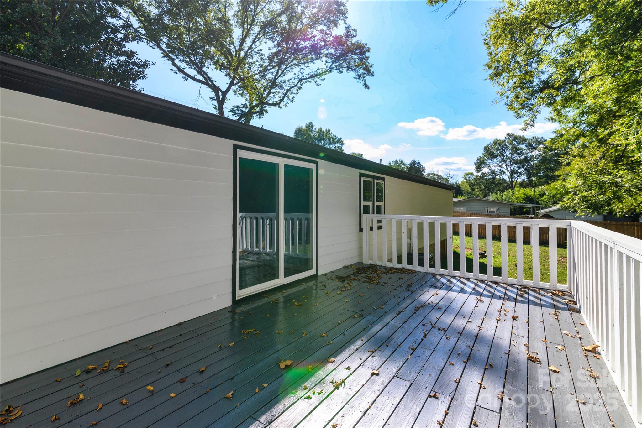 4946 Grand Canyon Road Northwest Concord, NC 28027 - Photo 5 of 40 a view of deck with wooden floor and fence