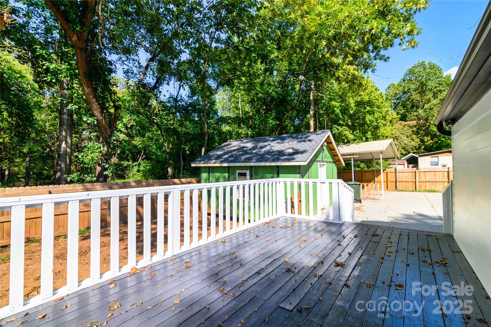 4946 Grand Canyon Road Northwest Concord, NC 28027 - Photo 6 of 40 a view of backyard with a deck and wooden floor