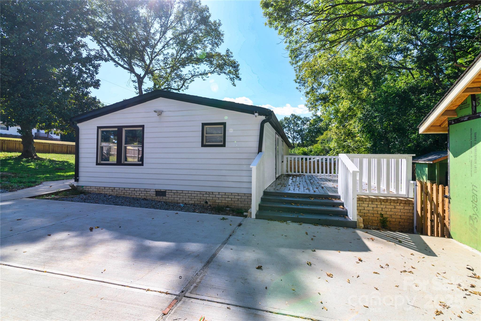 4946 Grand Canyon Road Northwest Concord, NC 28027 - Photo 7 of 40 a view of a house with a yard