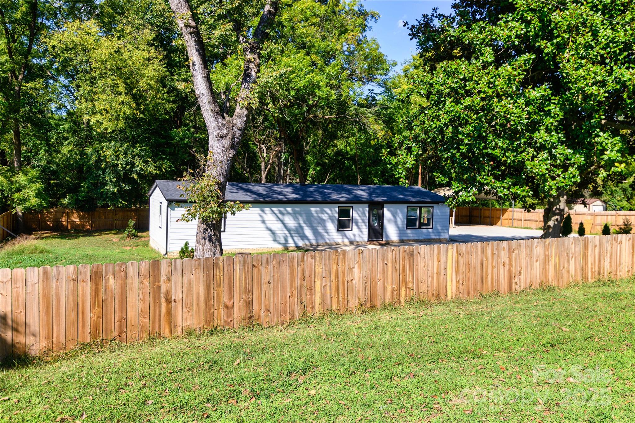 4946 Grand Canyon Road Northwest Concord, NC 28027 - Photo 9 of 40 a view of a wooden fence