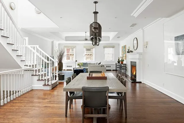 a spacious bedroom with a bed and window