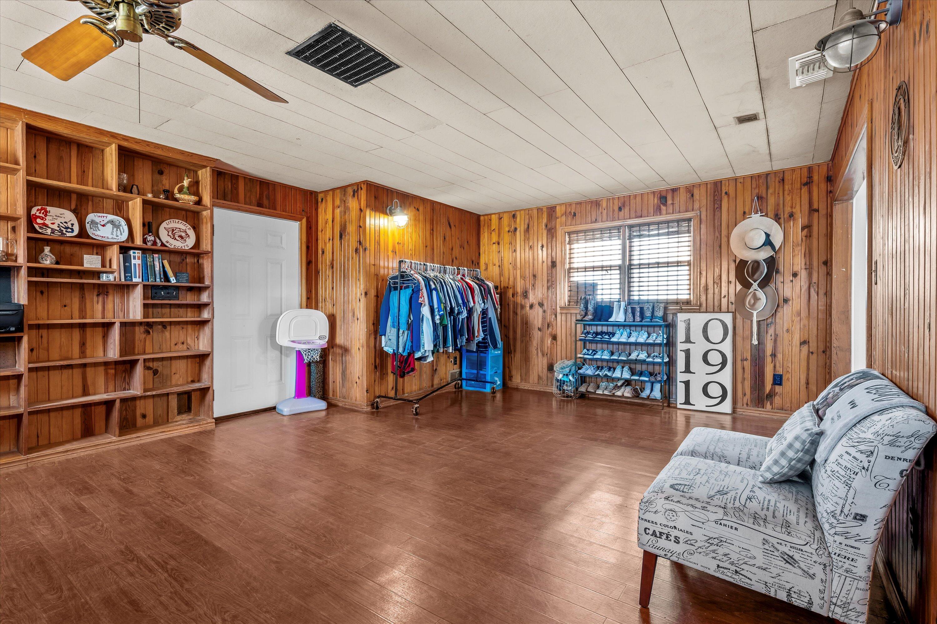 1601 Smith Street Littlefield, TX 79339 - Photo 25 of 32 a view of a livingroom with furniture and closet