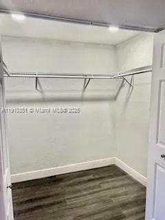 a view of a room with racks on the wall