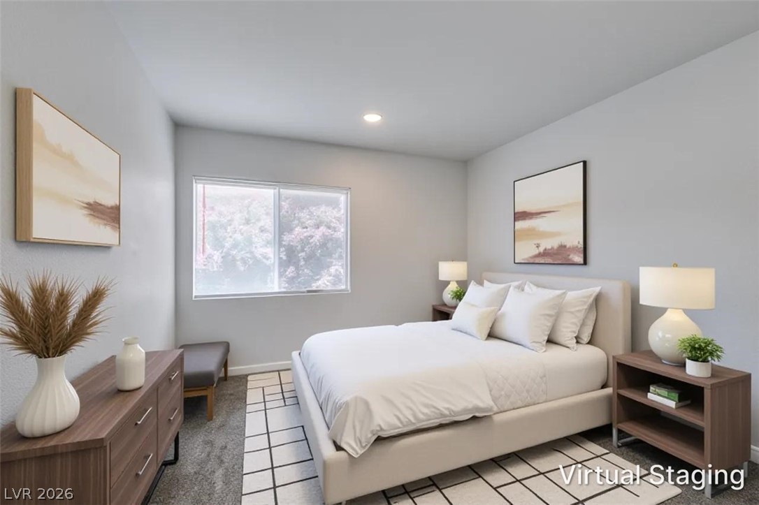 2113 Desert Peak Road Las Vegas, NV 89134 - Photo 21 of 33 This tranquil bedroom features natural light and soft finishes, ideal for peaceful slumber.