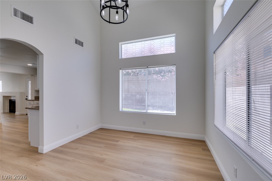 2113 Desert Peak Road Las Vegas, NV 89134 - Photo 8 of 33 Bright and airy living space featuring tall ceilings and natural light, creating an inviting atmosphere.