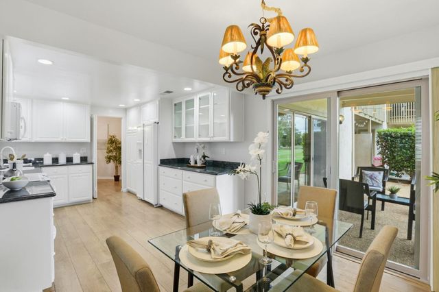 a view of a workspace with furniture