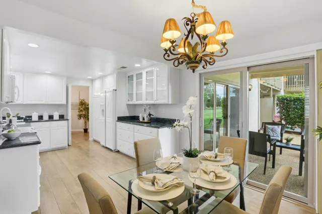 a view of a workspace with furniture