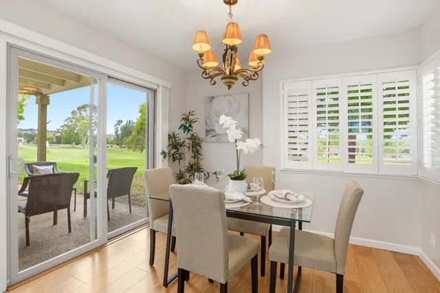 a spacious bedroom with a bed and a couch