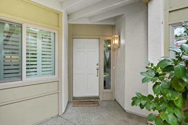 a view of a livingroom with furniture and wooden floor