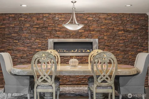 a view of a dining room with furniture