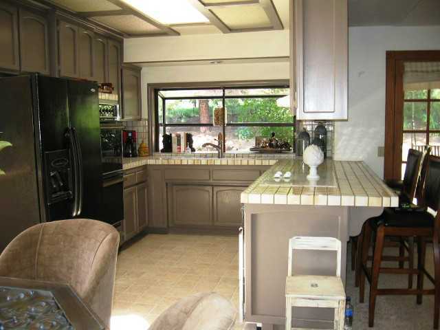 2832 Live Oak Park Road Fallbrook, CA 92028 - Photo 16 of 25 Tile counters with a large sink.