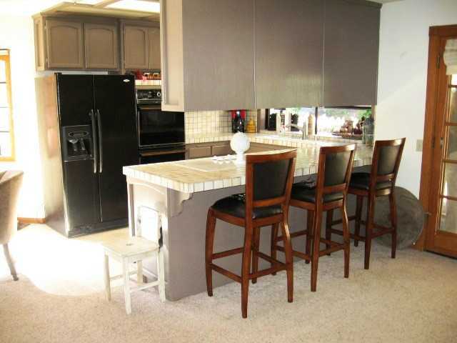 2832 Live Oak Park Road Fallbrook, CA 92028 - Photo 17 of 25 Great place to entertain next to the family room, open concept area.