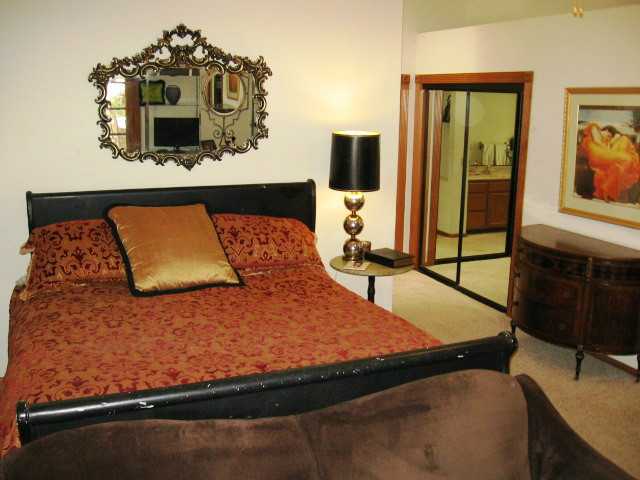 2832 Live Oak Park Road Fallbrook, CA 92028 - Photo 18 of 25 Large Master with French doors to back patio, mirrored closet doors, high vaulted ceilings.