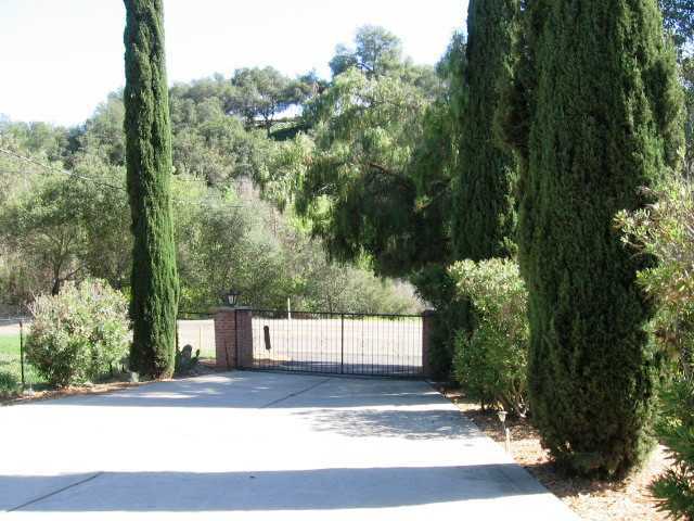 2832 Live Oak Park Road Fallbrook, CA 92028 - Photo 6 of 25 Electric fence for entrance of this amazing 1 acre property.