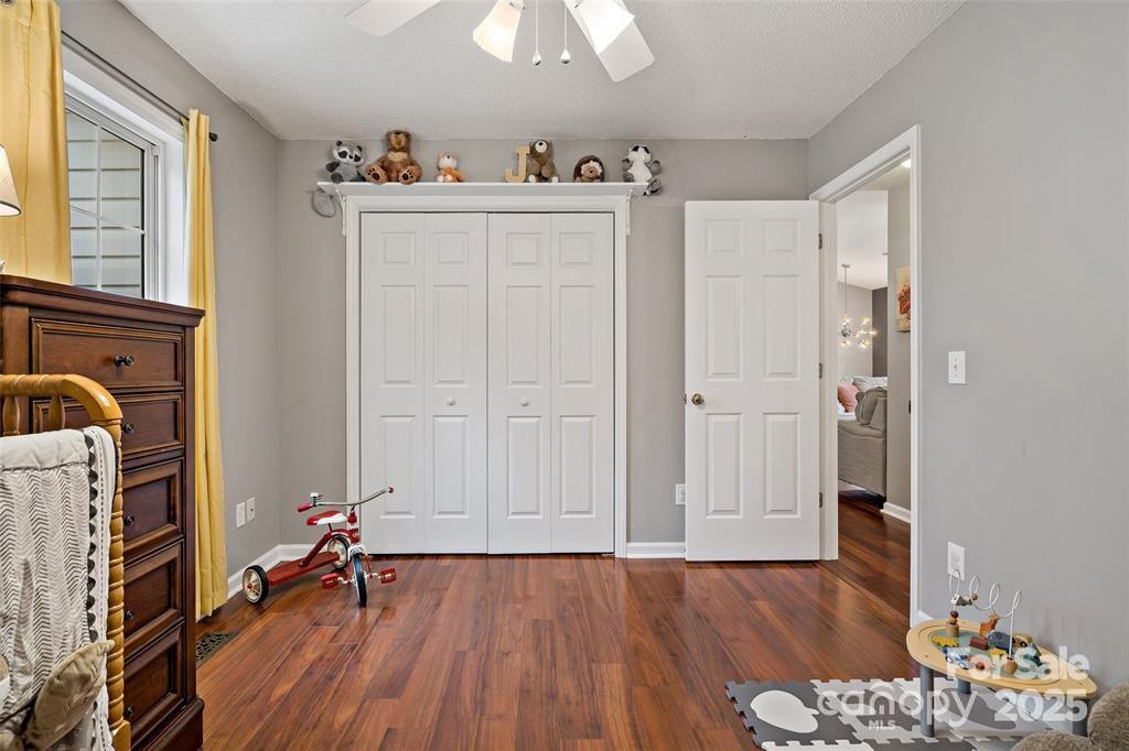 2691 Laurel Point Drive Nebo, NC 28761 - Photo 27 of 44 a view of a livingroom with wooden floor and furniture