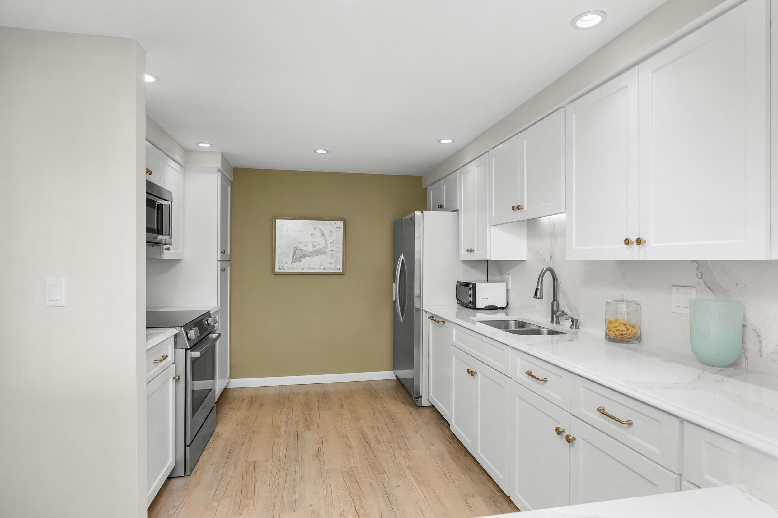 1 Belmont Road, Unit 341 West Harwich, MA 02671 - Photo 14 of 30 a kitchen with a sink a stove and refrigerator