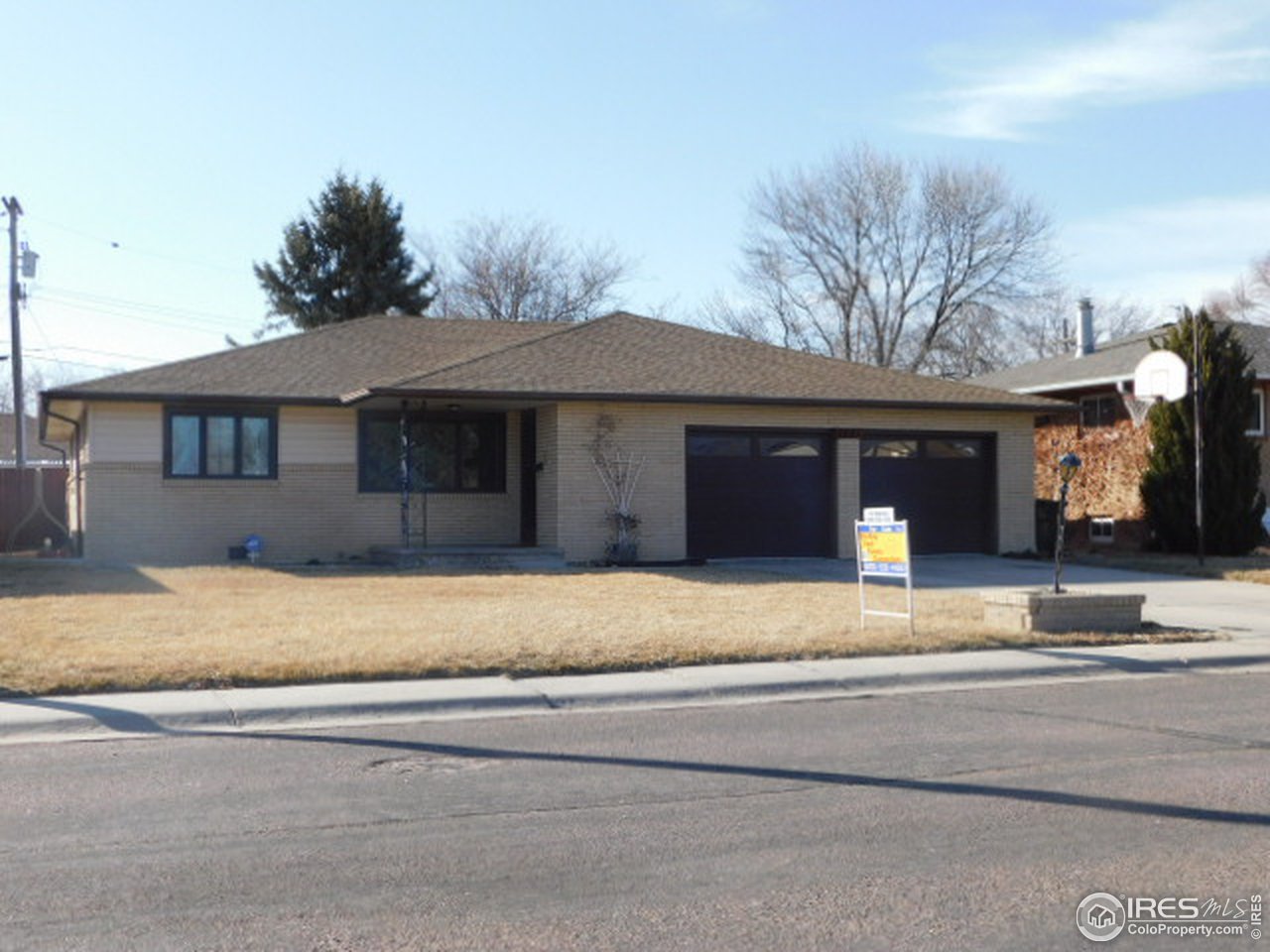1401 Adams Circle Sterling, CO 80751 - Photo 1 of 16 a house with a outdoor space