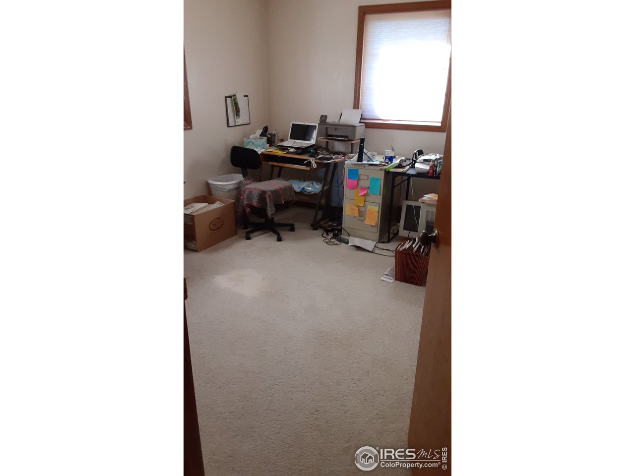 1401 Adams Circle Sterling, CO 80751 - Photo 12 of 16 a view of a workspace with furniture