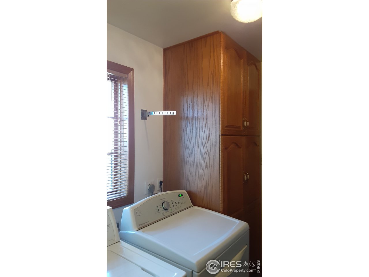 1401 Adams Circle Sterling, CO 80751 - Photo 13 of 16 a room with a table and a mirror