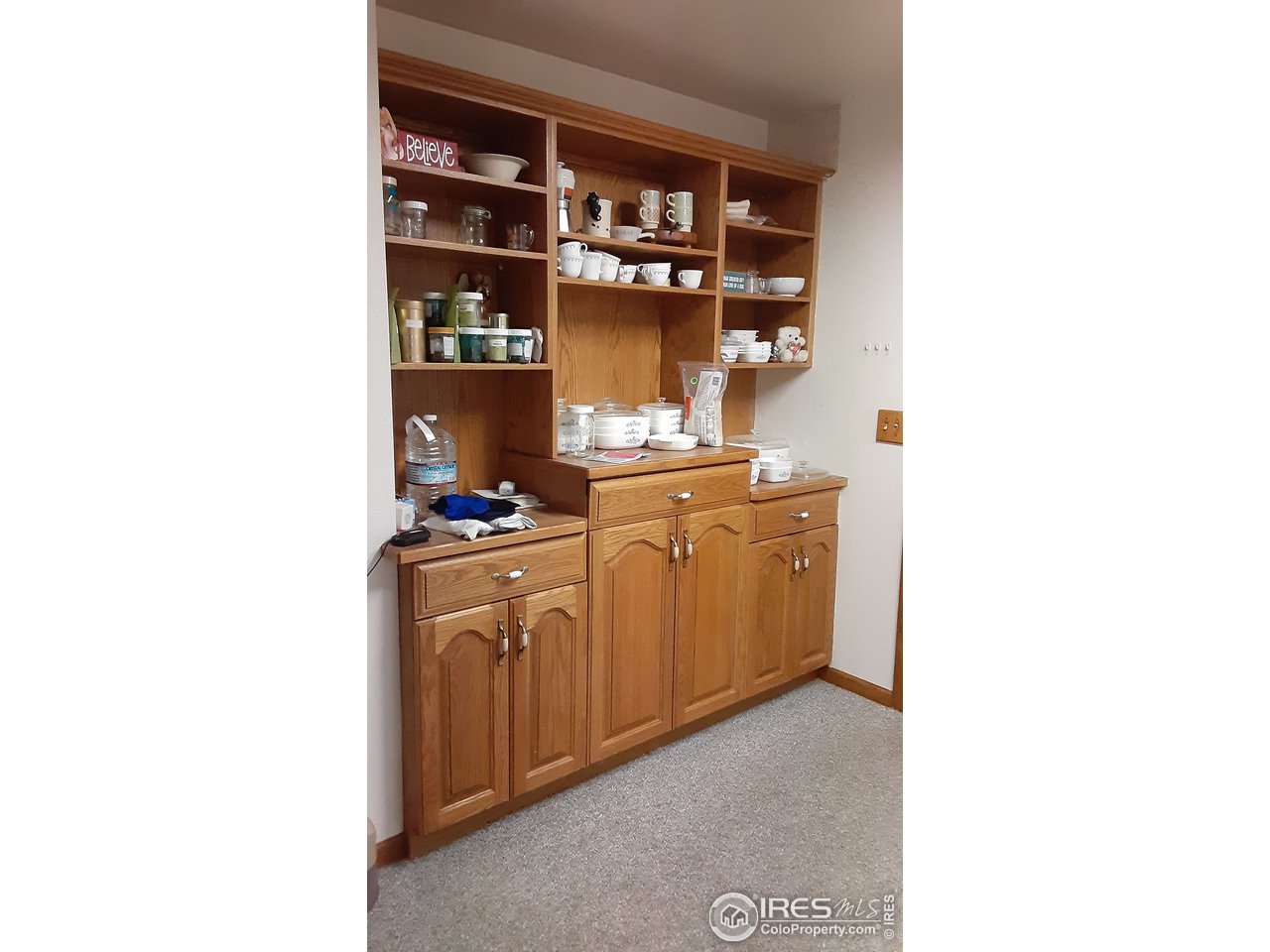 1401 Adams Circle Sterling, CO 80751 - Photo 10 of 16 a room with a sink and cabinets