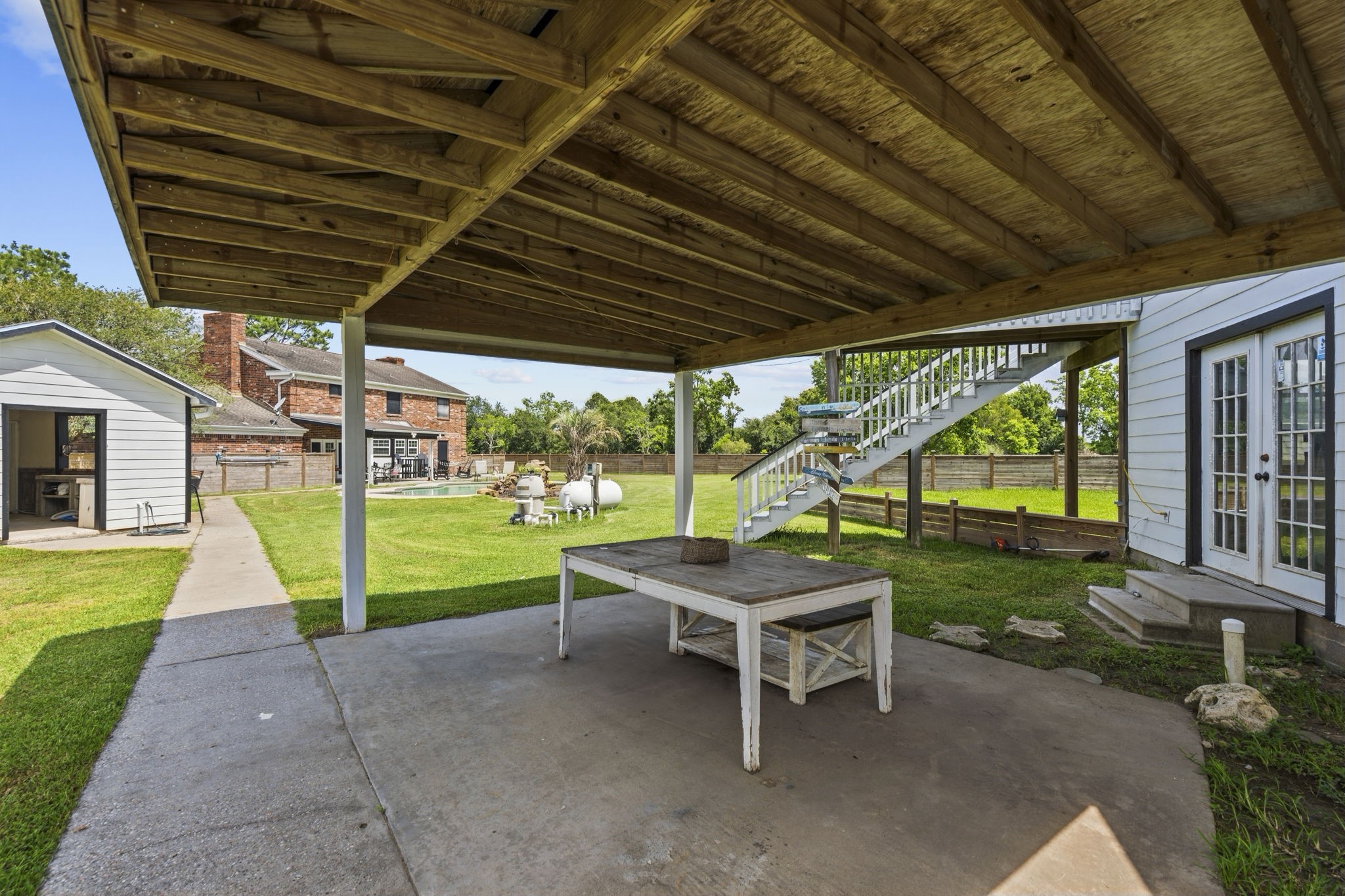 7009 Avenue R Santa Fe, TX 77510 - Photo 44 of 48 Covered outdoor patio area.