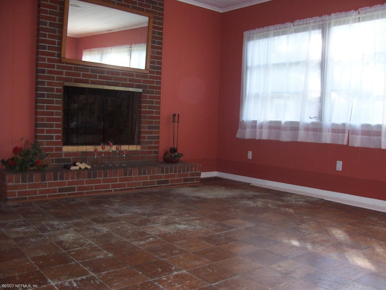 4908 Dundee Road Jacksonville, FL 32210 - Photo 8 of 16 a view of room with window