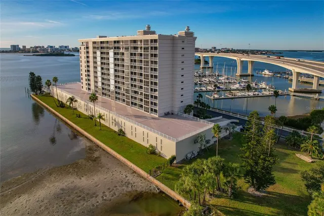 a view of a chair and tables in patio of the house