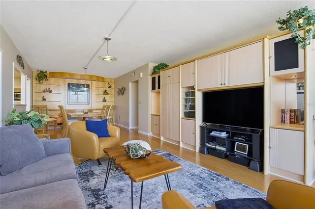 a bed room with a bed and a chair