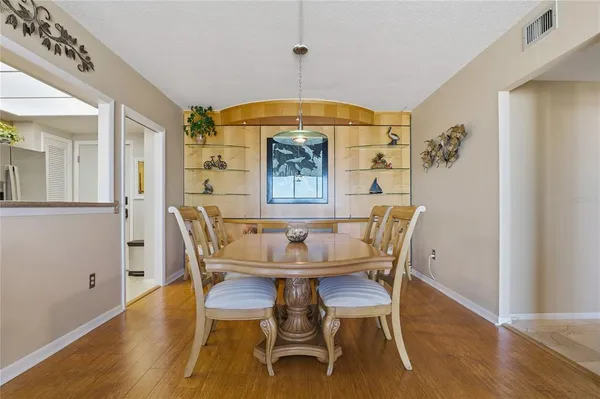 a bed room with a bed and a dresser