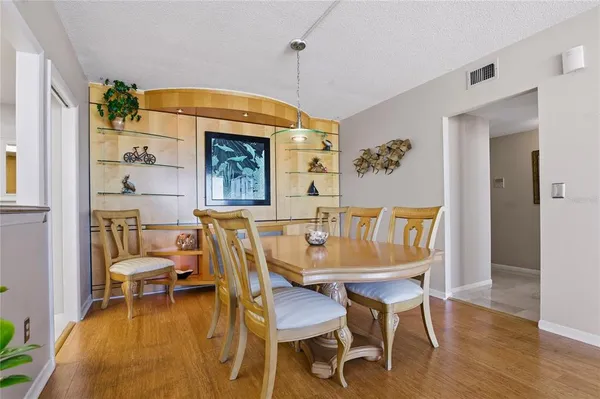 a workspace with furniture and a potted plant
