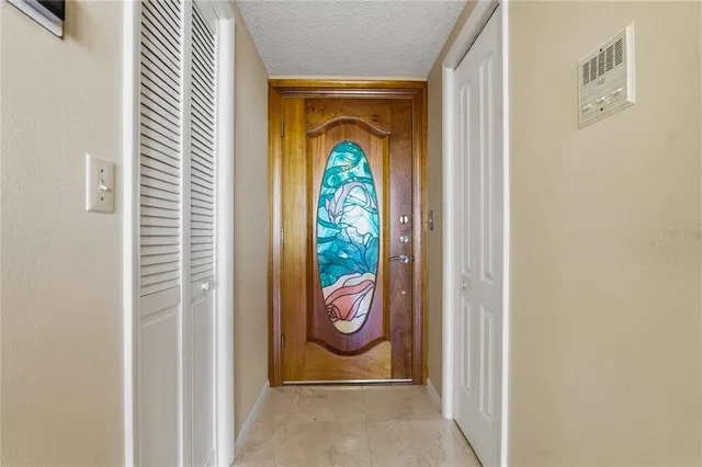 a view of a balcony with furniture