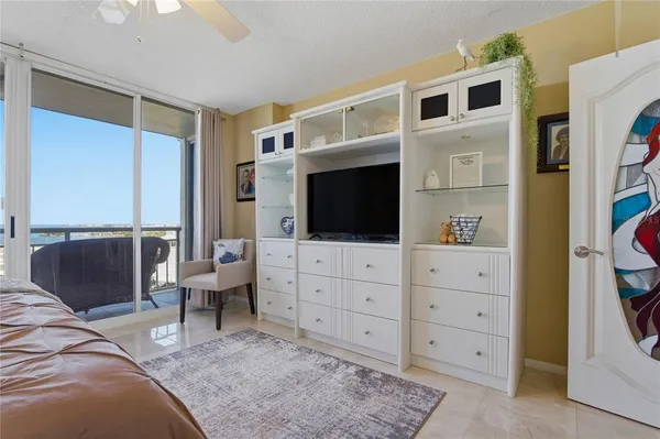a view of a porch with a potted plant