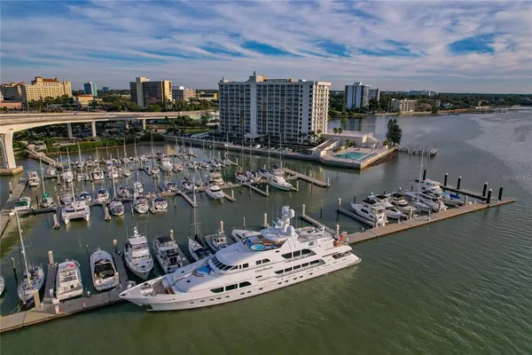 a view of a pool with chairs