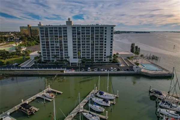 a view of a swimming pool with outdoor seating space