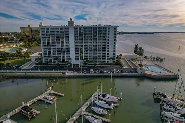 a view of a swimming pool with outdoor seating space