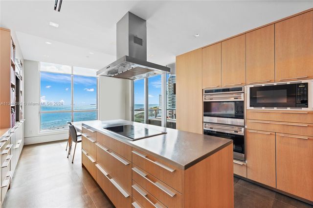 a room with furniture and a book shelf