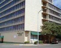 a view of a building with a street