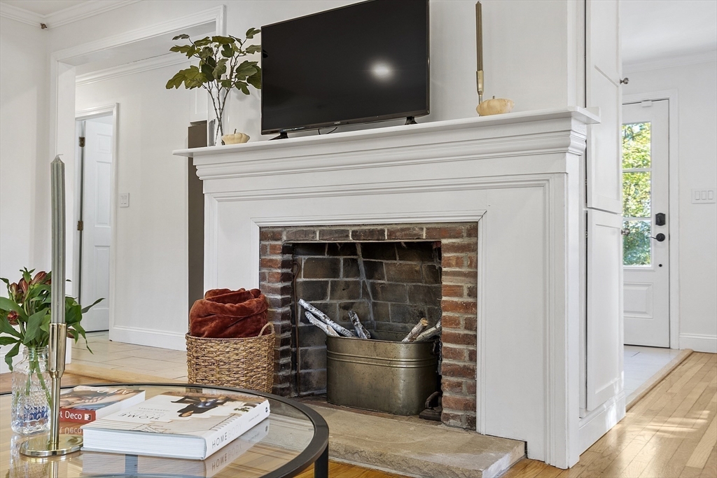 6 Gray Road Andover, MA 01810 - Photo 16 of 36 a living room with furniture and a fireplace