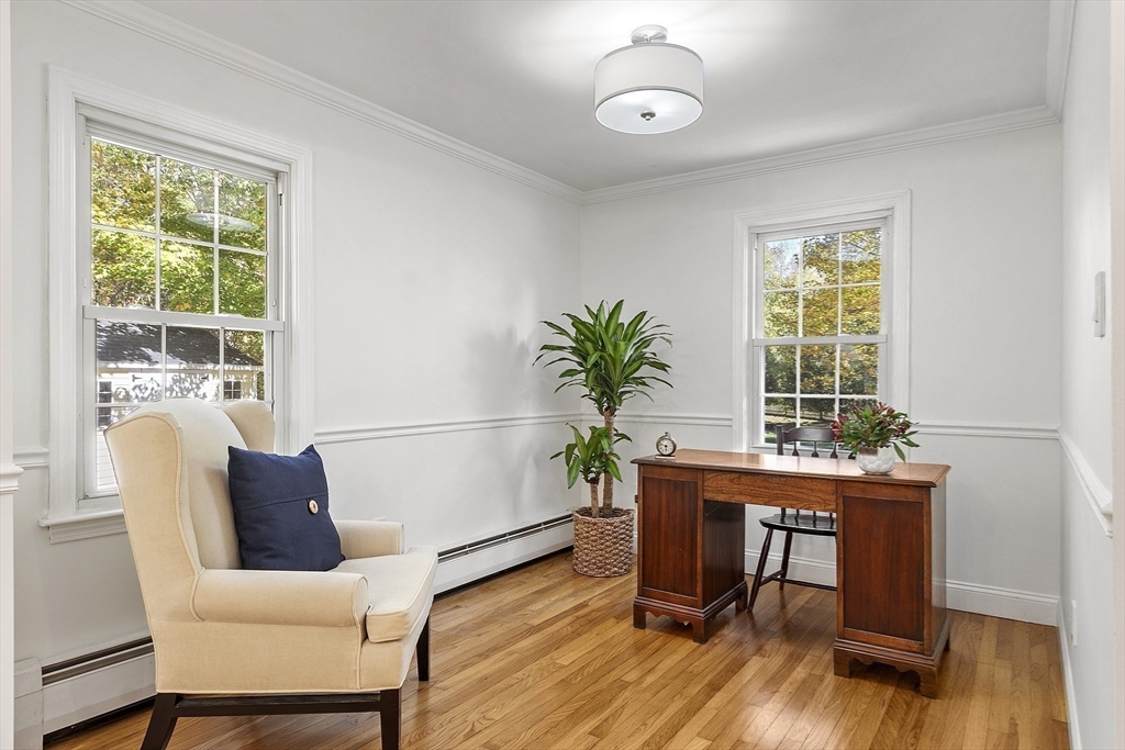 6 Gray Road Andover, MA 01810 - Photo 18 of 36 a work room with furniture and wooden floor