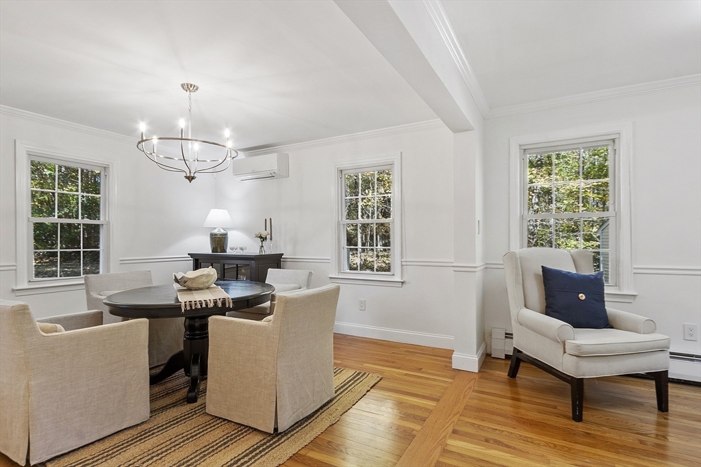 6 Gray Road Andover, MA 01810 - Photo 19 of 36 a living room with furniture a window and a table