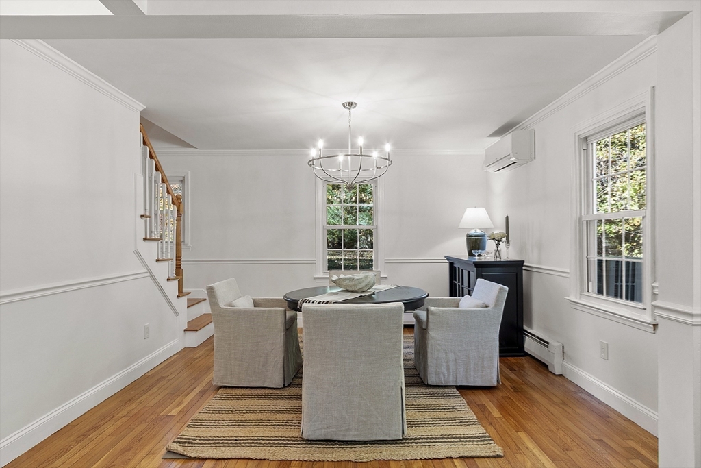 6 Gray Road Andover, MA 01810 - Photo 20 of 36 a view of a dining room with furniture window and wooden floor