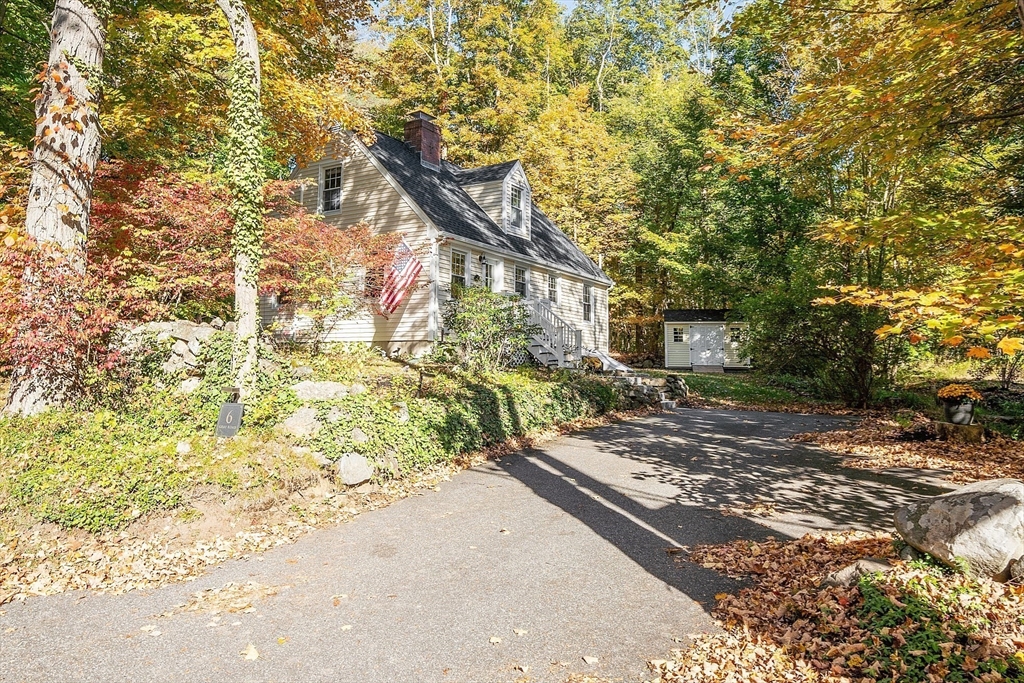 6 Gray Road Andover, MA 01810 - Photo 2 of 36 a view of a yard with flower plants
