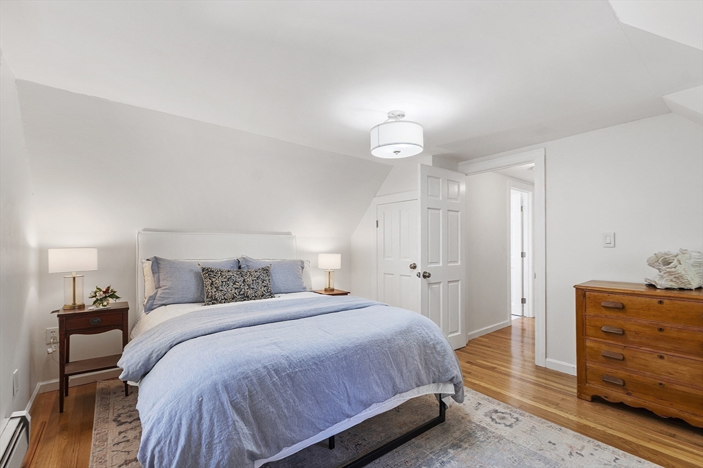 6 Gray Road Andover, MA 01810 - Photo 26 of 36 a bedroom with a bed and a dresser