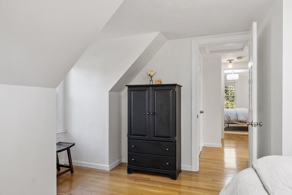 6 Gray Road Andover, MA 01810 - Photo 29 of 36 a view of a hallway with wooden floor and closet