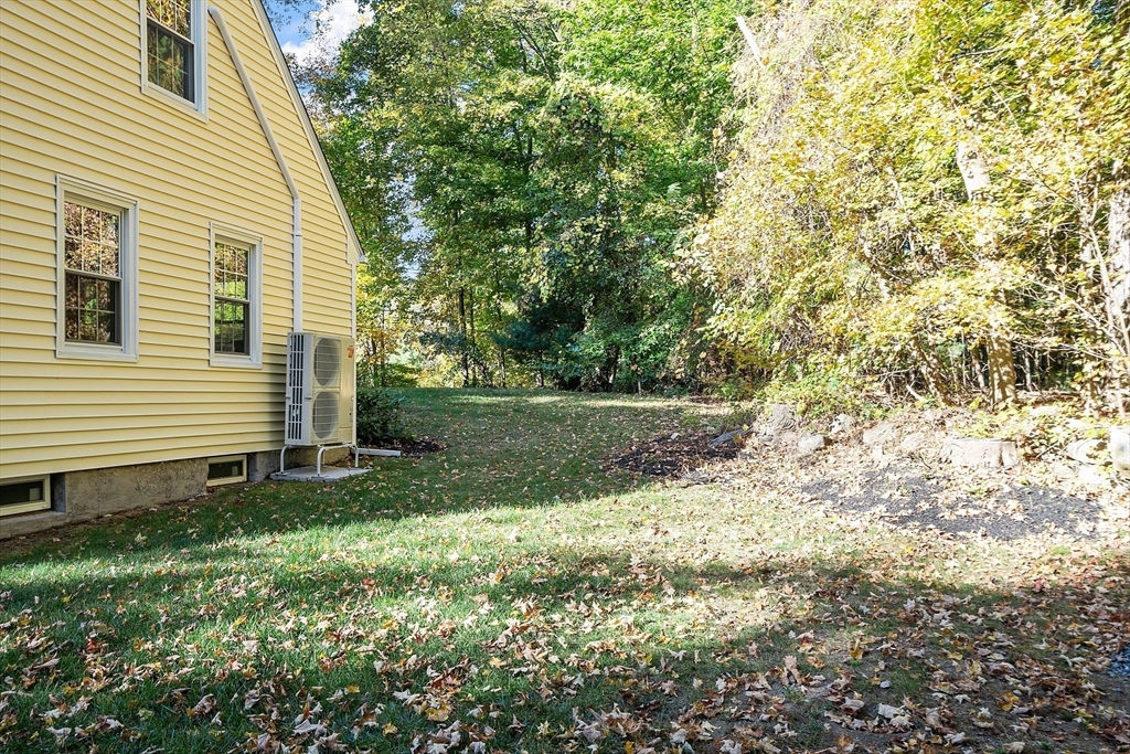 6 Gray Road Andover, MA 01810 - Photo 3 of 36 a view of backyard with small cabin