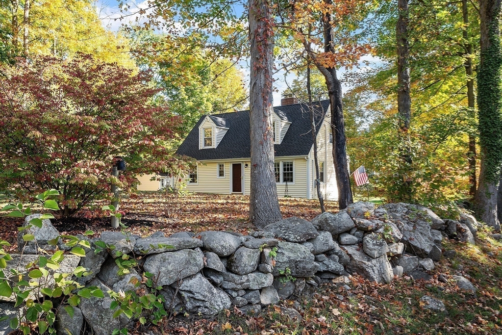 6 Gray Road Andover, MA 01810 - Photo 32 of 36 a sign board with large trees