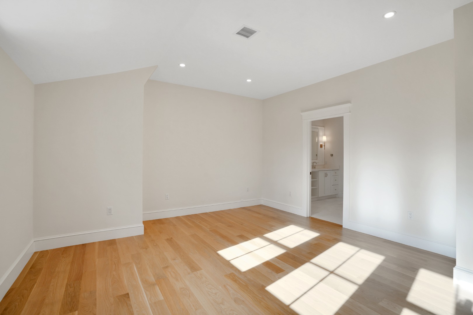 23 Pinehurst Road Edgartown, MA 02539 - Photo 39 of 57 a view of wooden floor and windows in a room